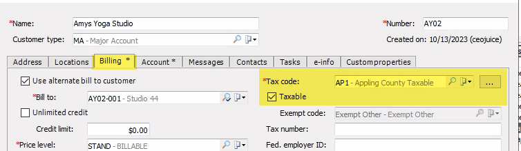 The tax settings are on the customer record, on the billing tab. This is where the tax code and whether the customer is taxable are set.